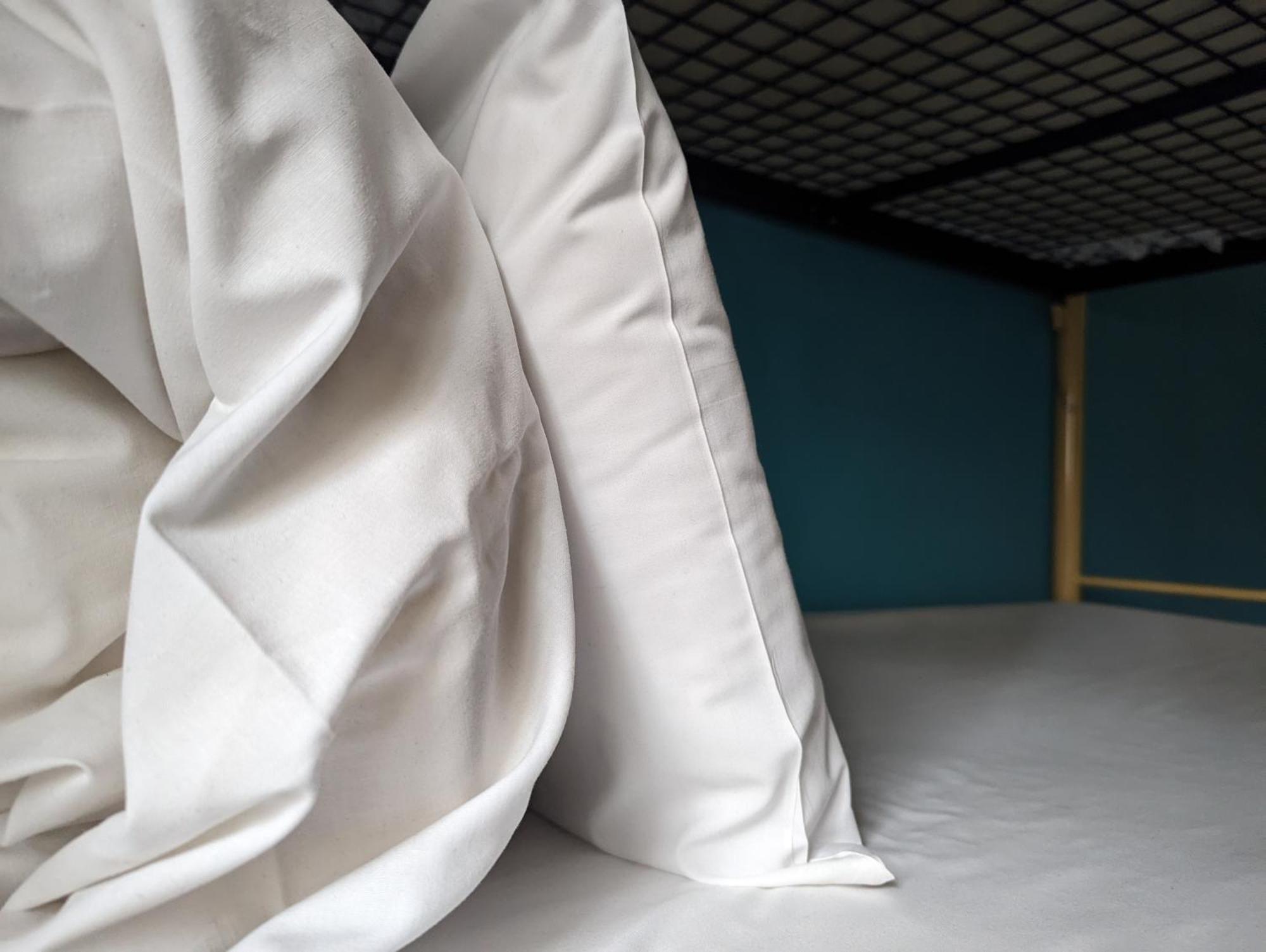 Single bed in 20 bed male dormitory room,1498939579:JPEG