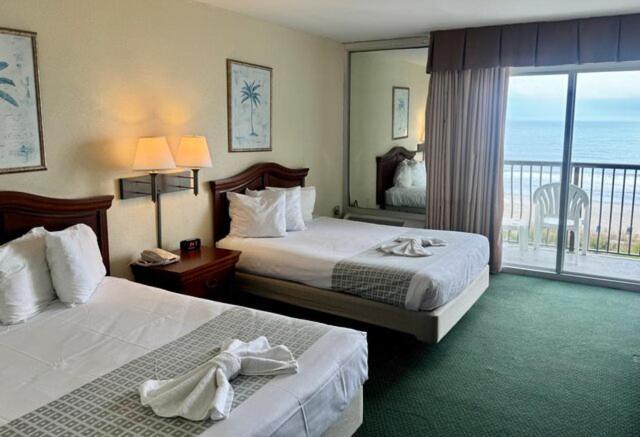 Room with Two Double Beds - Ocean Front,1669822759:JPEG
